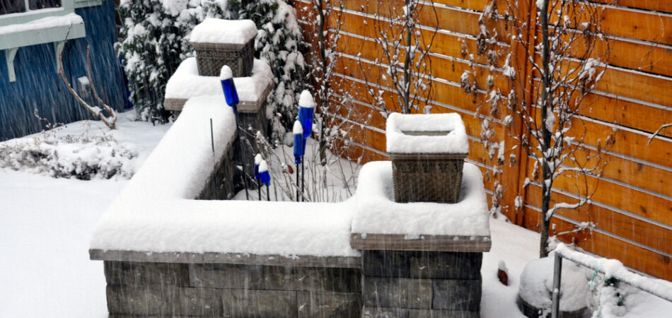 A,beautifully,designed,retaining,wall,functions,as,additional,seating,,and